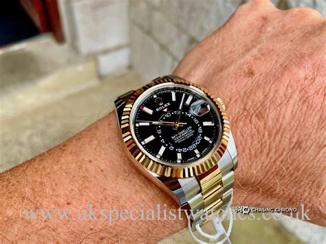 luxury rolex sky-dweller black dial gold & steel mens watch|Rolex oyster perpetual sky dweller.